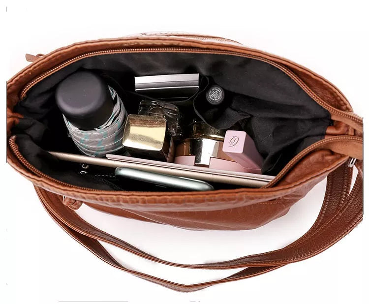 Lourdes - Bolsa Transversal de Couro