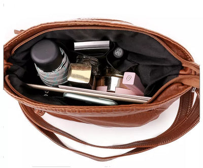 Lourdes - Bolsa Transversal de Couro